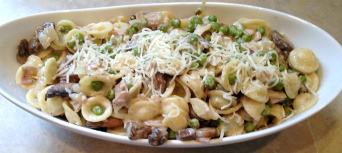 Orecchiette Pasta with Ham, Mushrooms and Peas can be served as either a main dish or a wonderful side for grilled pork chops or chicken. Simple and loaded with flavor!