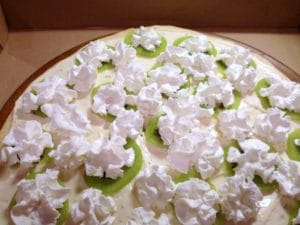 My Key Lime Pizza is the combination of key lime pie and a shortbread cookie crust. Baked and served with whipped cream and a tangy lime topping.