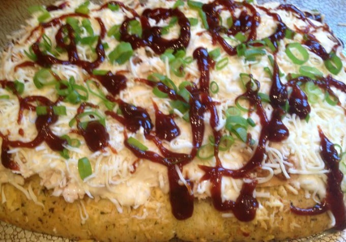 Get your grill ready to make this flavorful BBQ Chicken Pizza on Garlic Parmesan Focaccia. Done in user 30 minutes using store bought chicken and focaccia bread.