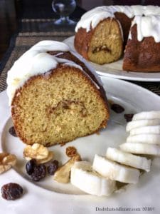 My Banana Streusel Coffee Cake is super moist with a sweet cream cheese frosting. Perfect for breakfast or dessert!