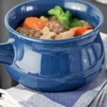 Slow Cooker Oktoberfest Stew is a wonderful fall meal featuring pork, bratwurst, white beans, beer and veggies.