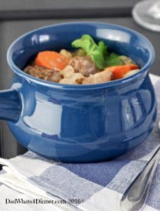 Slow Cooker Oktoberfest Stew is a wonderful fall meal featuring pork, bratwurst, white beans, beer and veggies.