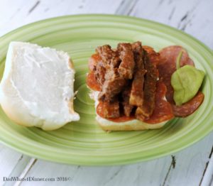 My Slow Cooker Pizza Steak Hoagies is a easy economical weeknight meal. You can feed a family of five for around ten dollars and you don't have to order from your local pizza parlor.