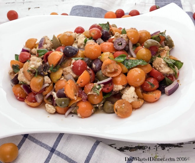 Cherry tomatoes, pitted olives, marinated fresh mozzarella and basil make this marinated Tomato Olive Salad super fresh and full of summer flavors.