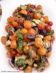 Cherry tomatoes, pitted olives, marinated fresh mozzarella and basil make this marinated Tomato Olive Salad super fresh and full of summer flavors.
