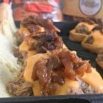 Beer Braised Shredded Beef Sliders are the best non-traditional slider you will ever have. Slow cooked beef, beer cheese, caramelized onions on a soft slider bun.