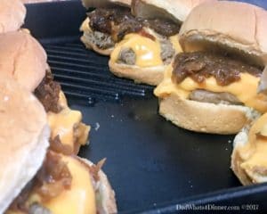Beer Braised Shredded Beef Sliders are the best non-traditional slider you will ever have. Slow cooked beef, beer cheese, caramelized onions on a soft slider bun.