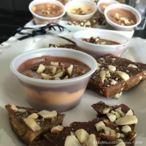 These Toffee Pudding Shots combine the flavors of sweet buttery flavor of caramel toffee with layers of chocolate. almonds and some Christmas cheer.