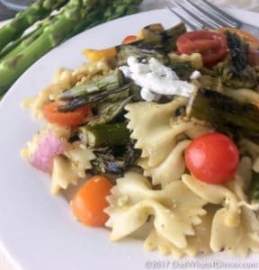 If you love pasta salad you will be blown away with my Grilled Asparagus Pasta Salad for #BBQWeek. Veggies grilled to perfection with a tangy basil and roasted garlic vinaigrette. #BBQWeek