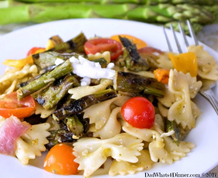 If you love pasta salad you will be blown away with my Grilled Asparagus Pasta Salad for #BBQWeek. Veggies grilled to perfection with a tangy basil and roasted garlic vinaigrette. #BBQWee