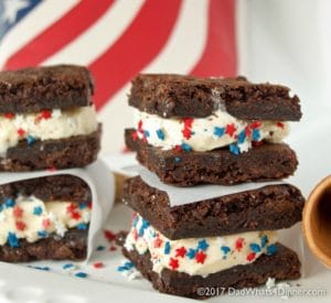 These Ghirardelli Brownie Ice Cream Sandwiches is the perfect treat for summer. Decadent triple chocolate brownies stuffed with cool vanilla ice cream!