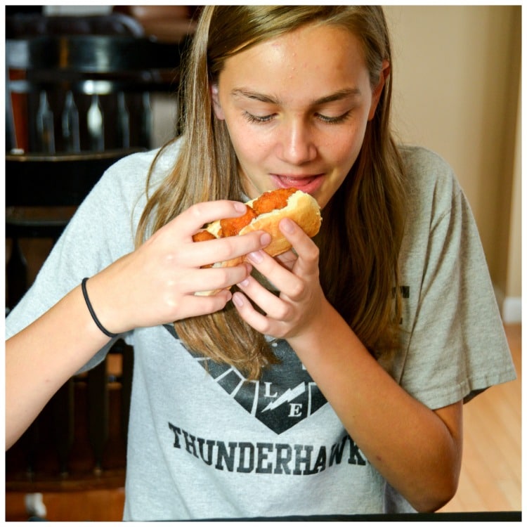 My daughter Ella trying these Boneless Honey BBQ Chicken Roll with Creamy Ranch Sauce for a quick and simple trick or treat night snack you can make with your kids.