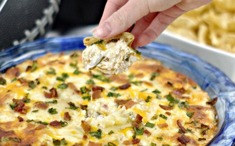Bubbly Baked Tater Tot Popper Dip is a mash-up of two of my favorites, tater tots, and jalapeno popper dip. Perfect for tailgating or family game night.